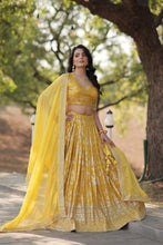 Load image into Gallery viewer, Stunning Dyeable Viscose Jacquard Yellow Lehenga Choli Set with Embroidered Sequins Work ClothsVilla