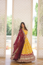 Load image into Gallery viewer, Stunning Viscose Jacquard Yellow Lehenga Set with Embroidered Sequins and Faux Blooming Dupatta ClothsVilla