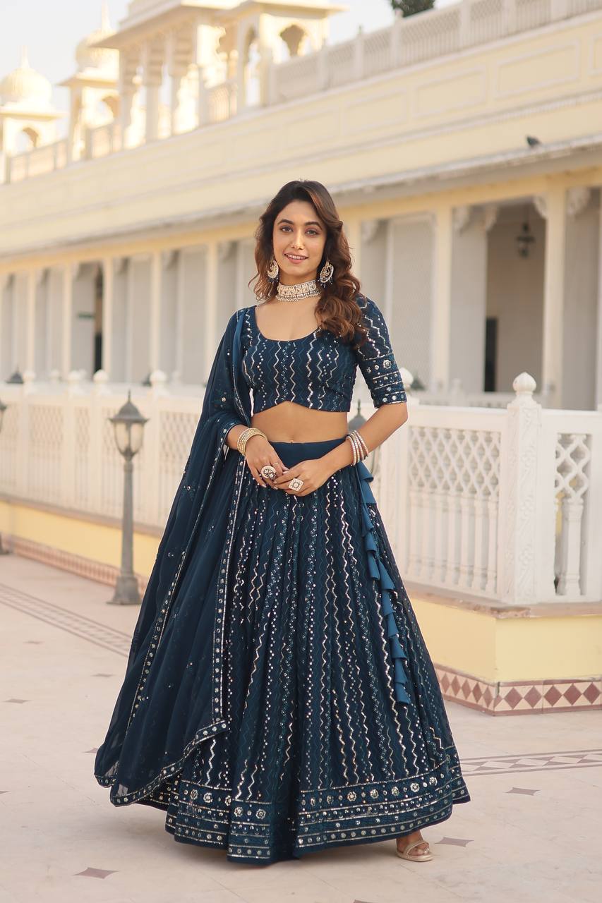 Teal Dazzling Faux Blooming Lehenga Choli with Sequins & Thread Embroidery ClothsVilla