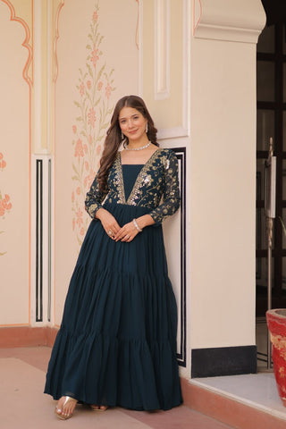 Teal Faux Blooming Fabric Embroidered Gown with 12-Meter Flair & Fancy V-Neck Design ClothsVilla