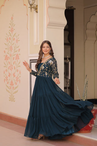 Teal Faux Blooming Fabric Embroidered Gown with 12-Meter Flair & Fancy V-Neck Design ClothsVilla