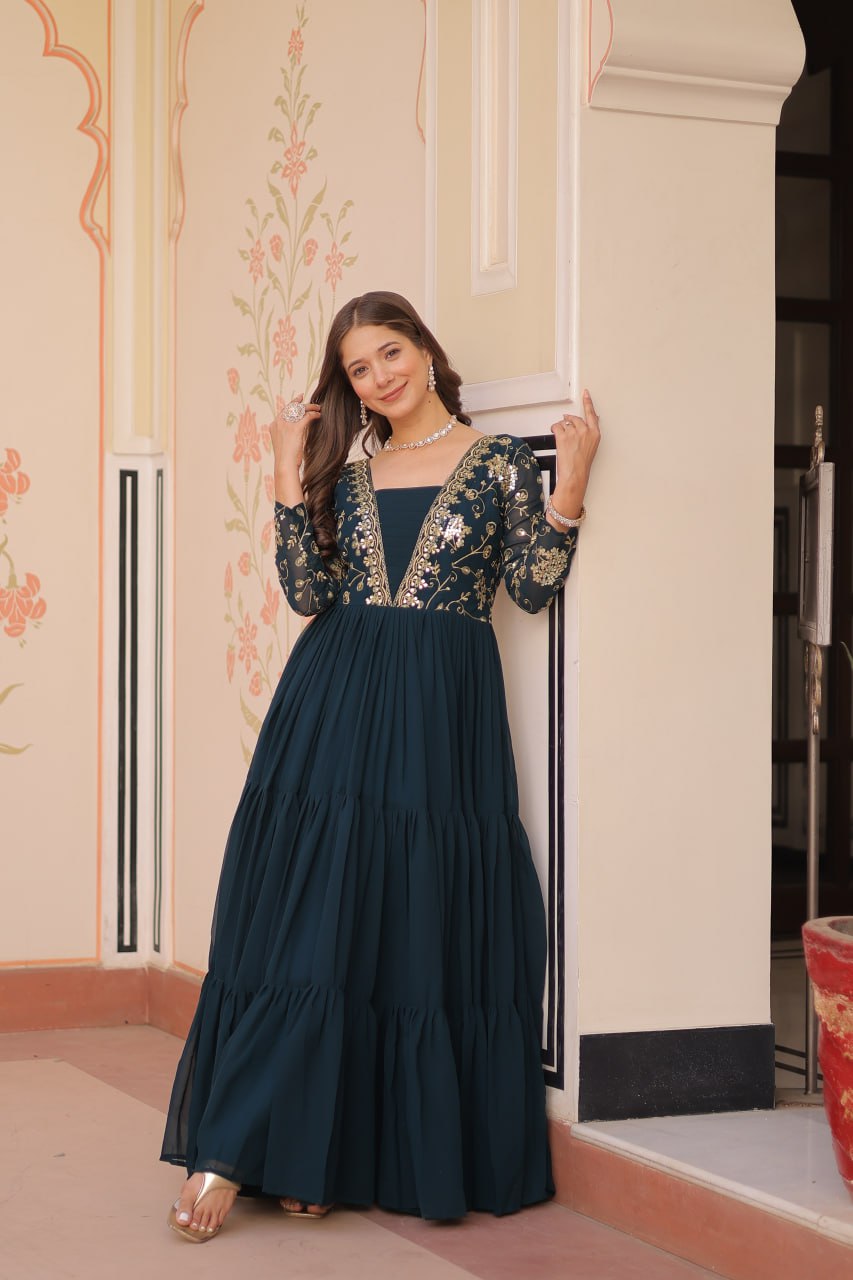 Teal Faux Blooming Fabric Embroidered Gown with 12-Meter Flair & Fancy V-Neck Design ClothsVilla
