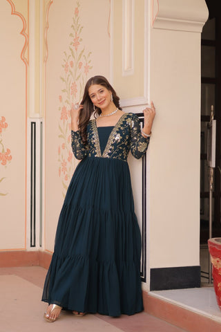 Teal Faux Blooming Fabric Embroidered Gown with 12-Meter Flair & Fancy V-Neck Design ClothsVilla