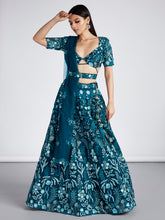 Load image into Gallery viewer, Teal Net Sequins, Mirror and thread embroidery Semi-Stitched Lehenga choli &amp; Dupatta Clothsvilla