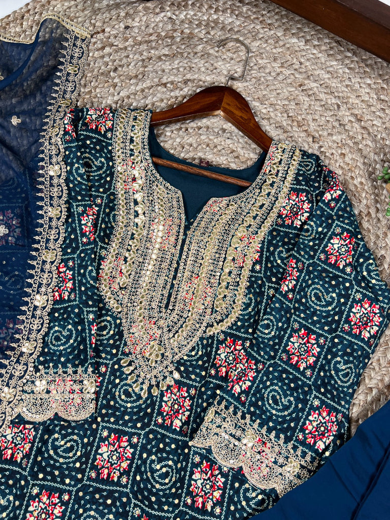 Teal Stylish Rayon Printed Suit Set with Embroidered Organza Dupatta – Stitched Top & Bottom Clothsvilla