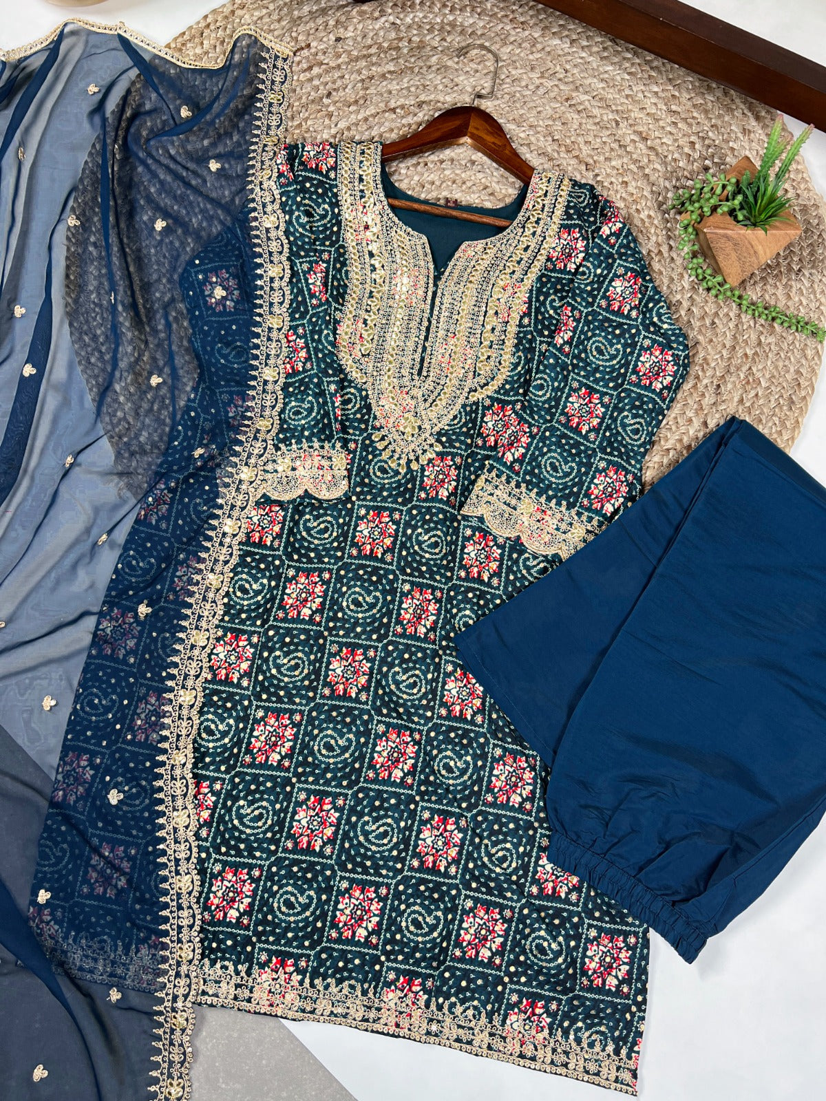 Teal Stylish Rayon Printed Suit Set with Embroidered Organza Dupatta – Stitched Top & Bottom Clothsvilla