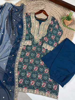 Teal Stylish Rayon Printed Suit Set with Embroidered Organza Dupatta – Stitched Top & Bottom Clothsvilla