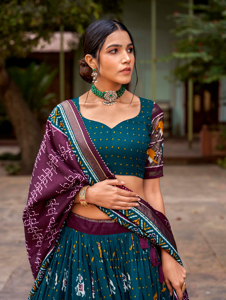 Teal Tussar Silk Lehenga Choli with Enchanting Ikat Patola Print and Foil Work ClothsVilla