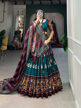 Load image into Gallery viewer, Teal Tussar Silk Lehenga Choli with Enchanting Ikat Patola Print and Foil Work ClothsVilla