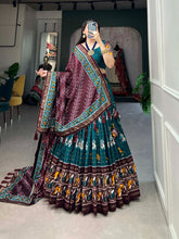 Load image into Gallery viewer, Teal Tussar Silk Lehenga Choli with Enchanting Ikat Patola Print and Foil Work ClothsVilla