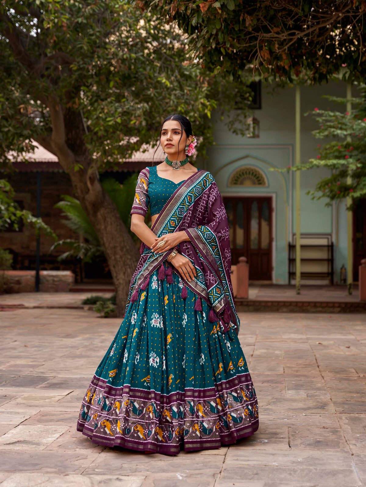 Teal Tussar Silk Lehenga Choli with Enchanting Ikat Patola Print and Foil Work ClothsVilla Main image
