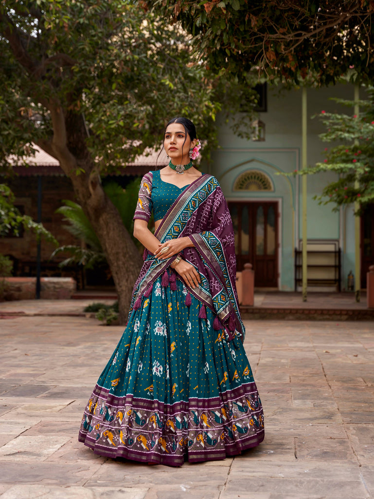 Teal Tussar Silk Lehenga Choli with Enchanting Ikat Patola Print and Foil Work ClothsVilla