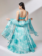 Load image into Gallery viewer, Turquoise Blue Organza Floral Printed Semi-Stitched Lehenga choli &amp; Dupatta Clothsvilla