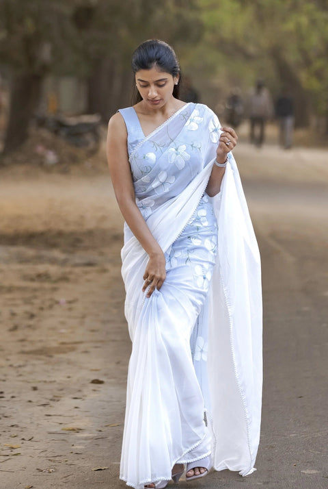 Sky Blue Pure Georgette Hand-Painted Saree with White Floral Motifs and Sequins | Modal Satin Blouse FANCY SAREES Main image