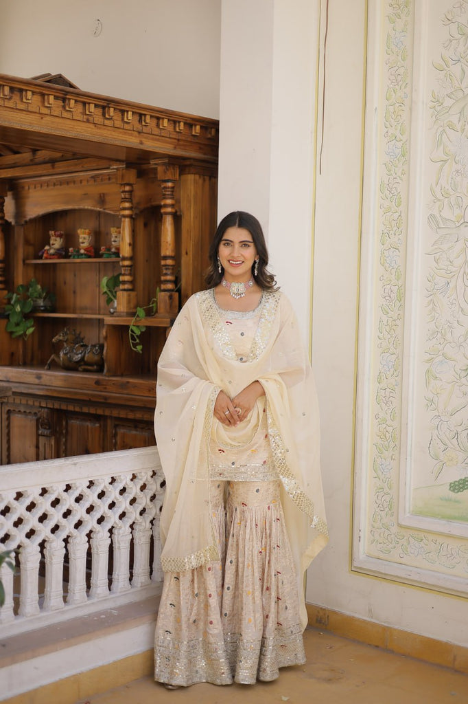 Viscose Jacquard Sequined Off White Kurti with Embroidered Sharara & Russian Silk Dupatta ClothsVilla