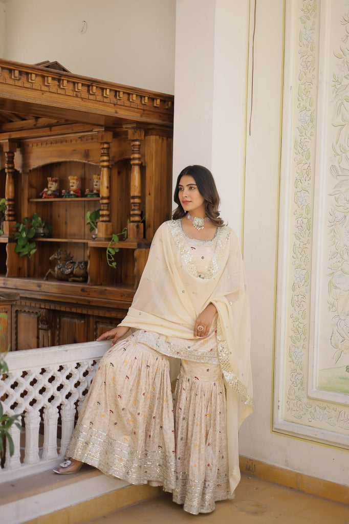 Viscose Jacquard Sequined Off White Kurti with Embroidered Sharara & Russian Silk Dupatta ClothsVilla