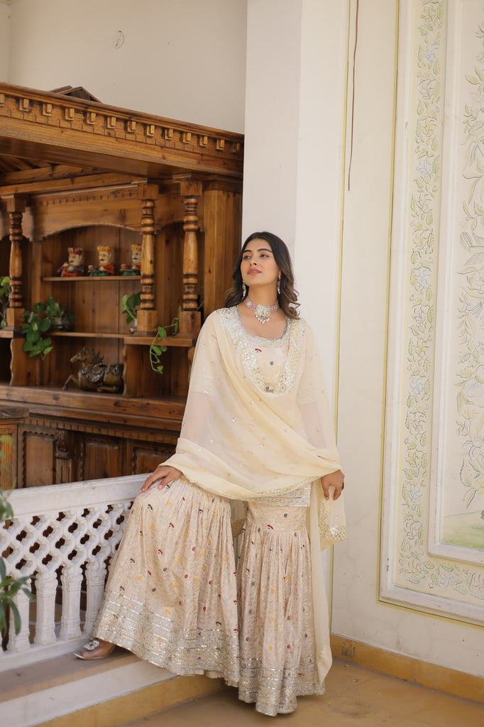 Viscose Jacquard Sequined Off White Kurti with Embroidered Sharara & Russian Silk Dupatta ClothsVilla