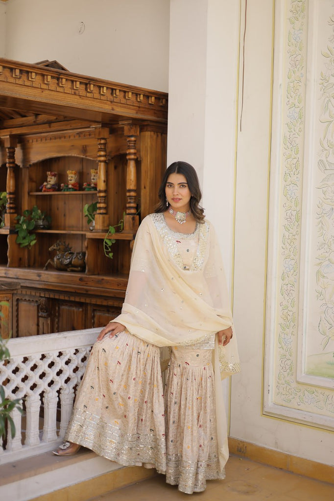 Viscose Jacquard Sequined Off White Kurti with Embroidered Sharara & Russian Silk Dupatta ClothsVilla