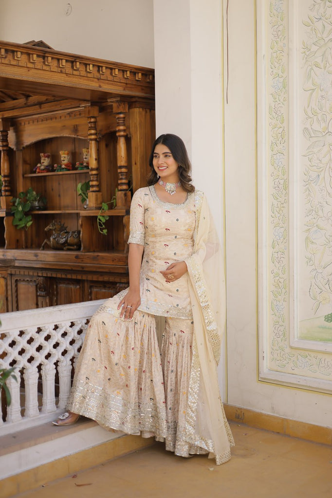 Viscose Jacquard Sequined Off White Kurti with Embroidered Sharara & Russian Silk Dupatta ClothsVilla