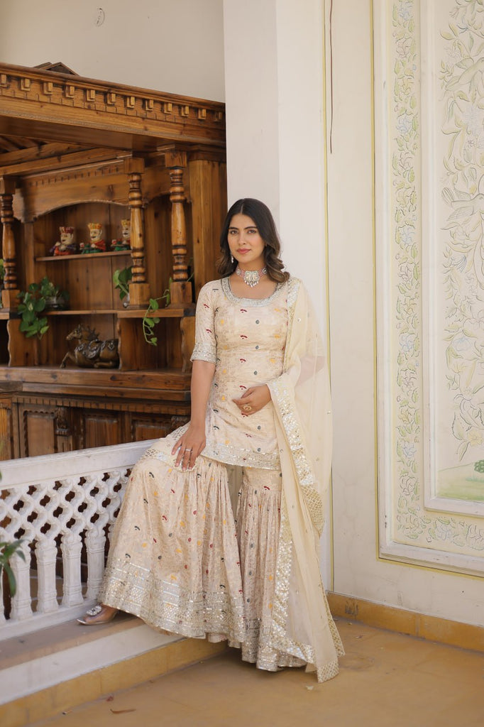 Viscose Jacquard Sequined Off White Kurti with Embroidered Sharara & Russian Silk Dupatta ClothsVilla