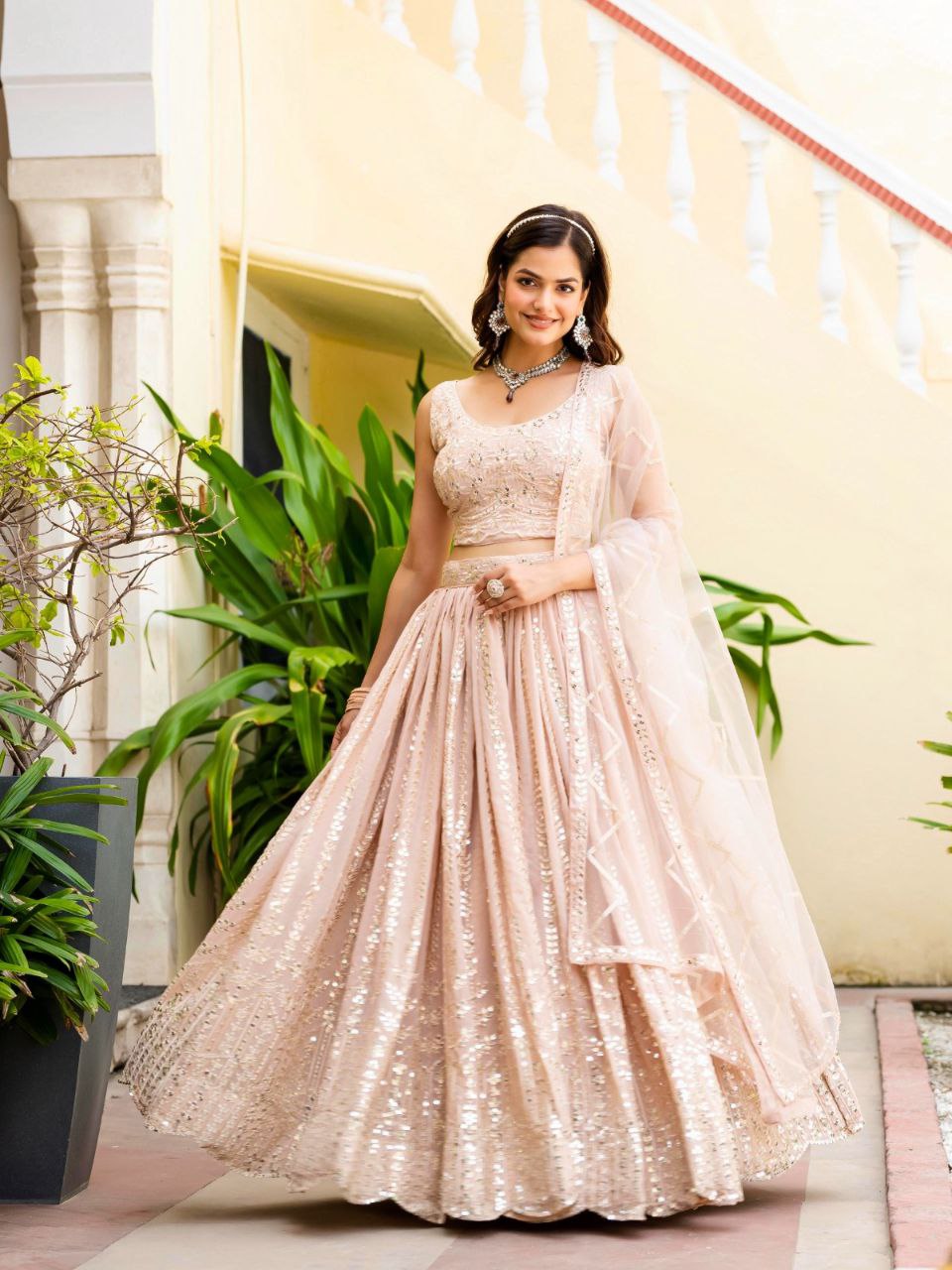 Warm Peach Luxurious Faux Georgette Zari & Sequin Embroidered Semi-Stitched Lehenga Choli with Net Embroidered Dupatta ClothsVilla Main image
