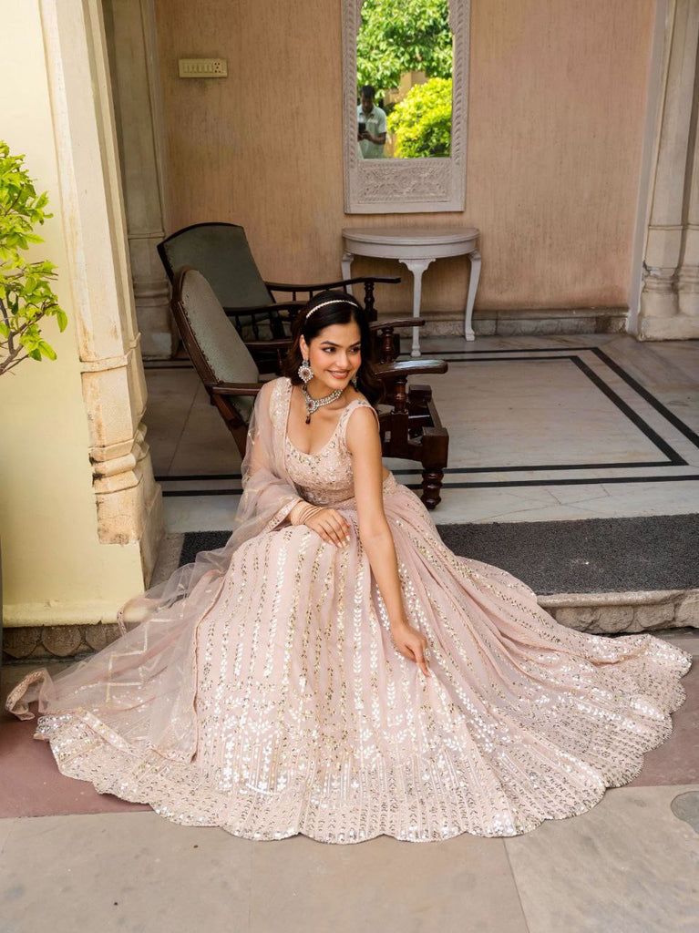 Warm Peach Luxurious Faux Georgette Zari & Sequin Embroidered Semi-Stitched Lehenga Choli with Net Embroidered Dupatta ClothsVilla