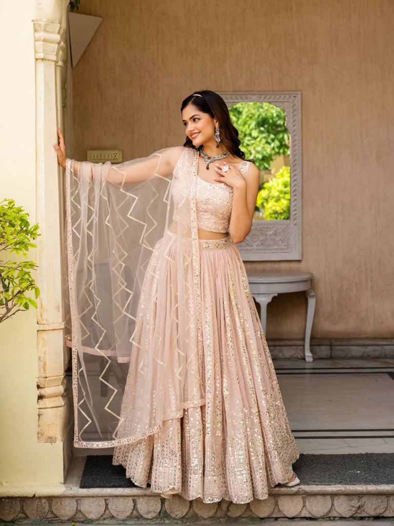 Warm Peach Luxurious Faux Georgette Zari & Sequin Embroidered Semi-Stitched Lehenga Choli with Net Embroidered Dupatta ClothsVilla