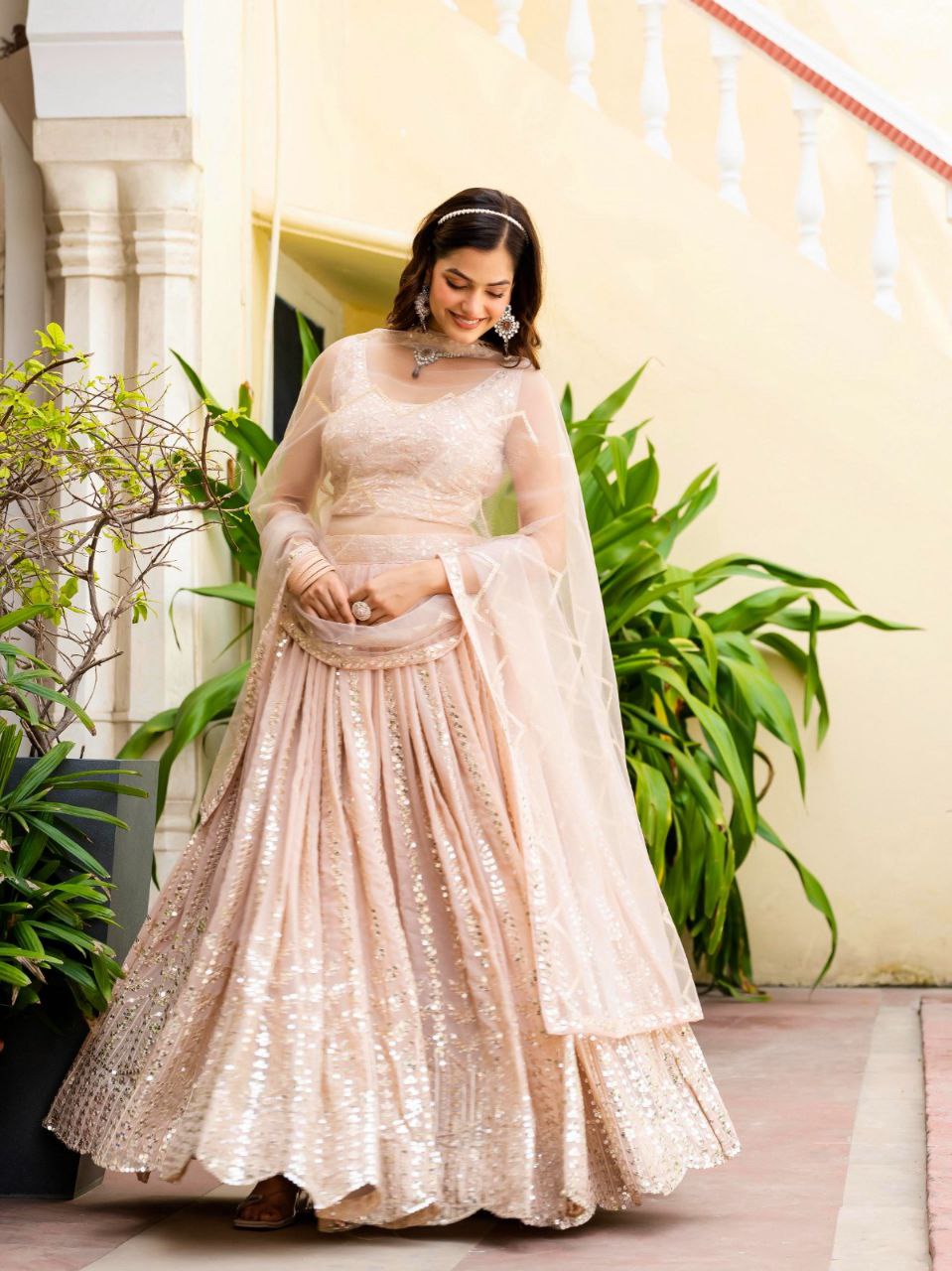 Warm Peach Luxurious Faux Georgette Zari & Sequin Embroidered Semi-Stitched Lehenga Choli with Net Embroidered Dupatta ClothsVilla