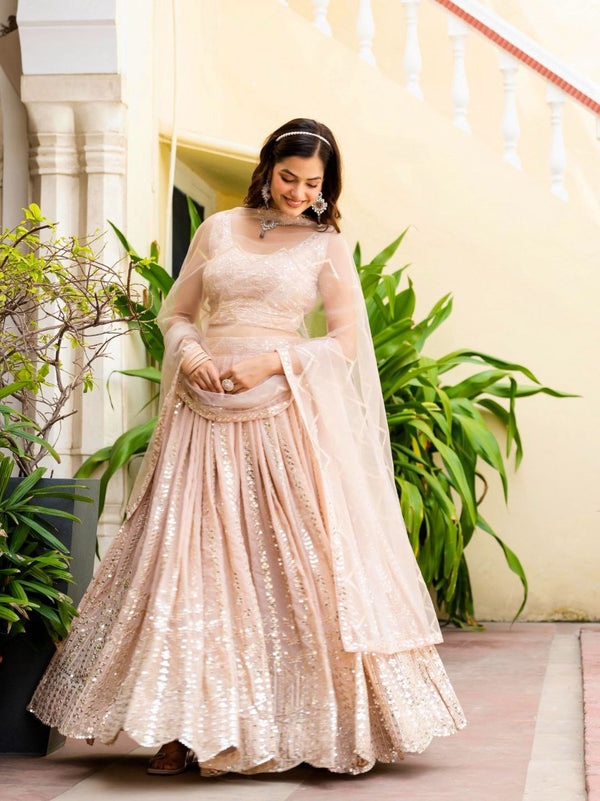 Warm Peach Luxurious Faux Georgette Zari & Sequin Embroidered Semi-Stitched Lehenga Choli with Net Embroidered Dupatta ClothsVilla
