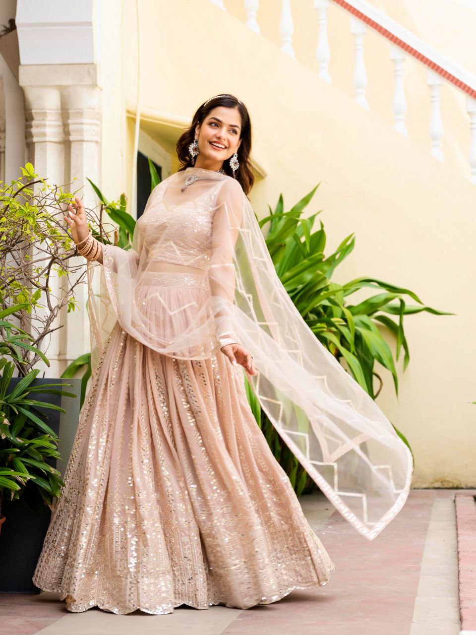 Warm Peach Luxurious Faux Georgette Zari & Sequin Embroidered Semi-Stitched Lehenga Choli with Net Embroidered Dupatta ClothsVilla