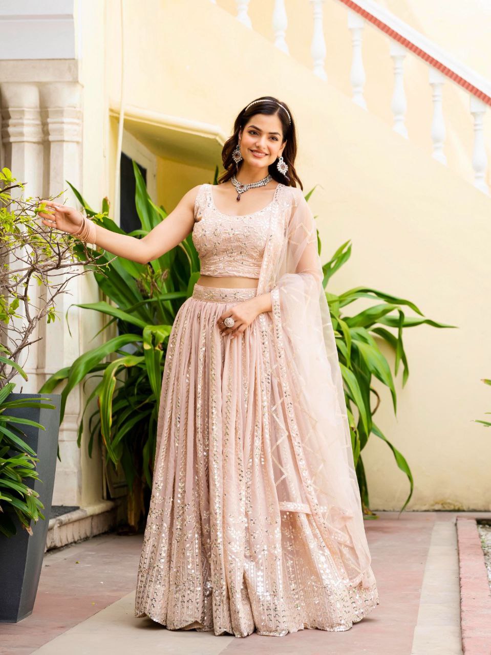 Warm Peach Luxurious Faux Georgette Zari & Sequin Embroidered Semi-Stitched Lehenga Choli with Net Embroidered Dupatta ClothsVilla