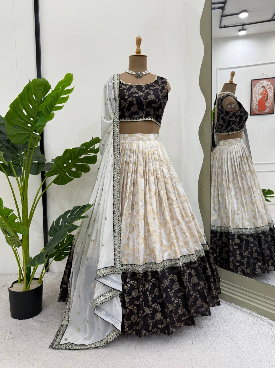 White & Black Glamorous Jequrd Semi-Stitched Lehenga Set with Sequins & Coding Work ClothsVilla Main image