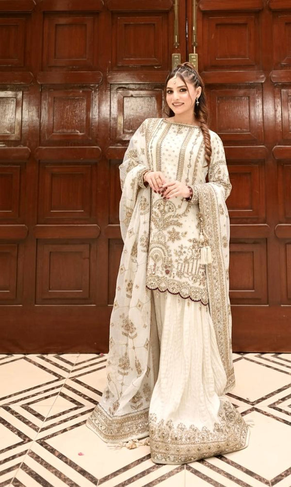 White Designer Faux Georgette Heavy Embroidered Top & Plazzo Set with 5mm Sequins & Rivet Moti Work ClothsVilla