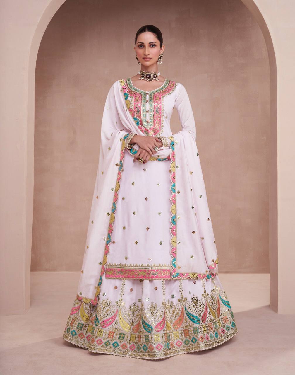 White Elegant Embroidered Chinon Kurti Lehenga Set with Faux Georgette Dupatta ClothsVilla Main image