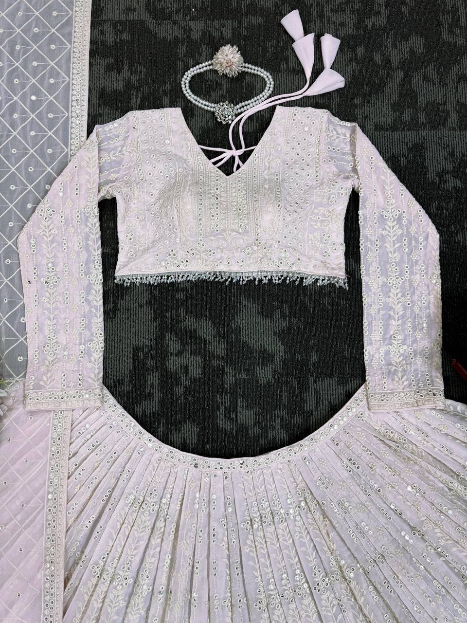 White Elegant Faux Georgette Lehenga Choli Set with  Sequin Work & Designer Dupatta Clothsvilla