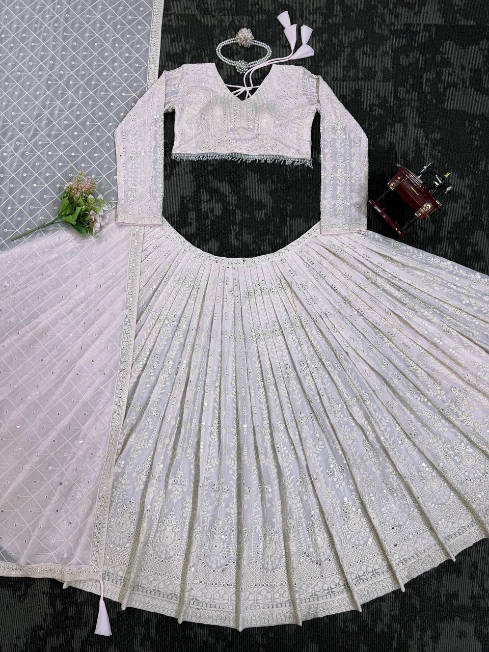White Elegant Faux Georgette Lehenga Choli Set with  Sequin Work & Designer Dupatta Clothsvilla