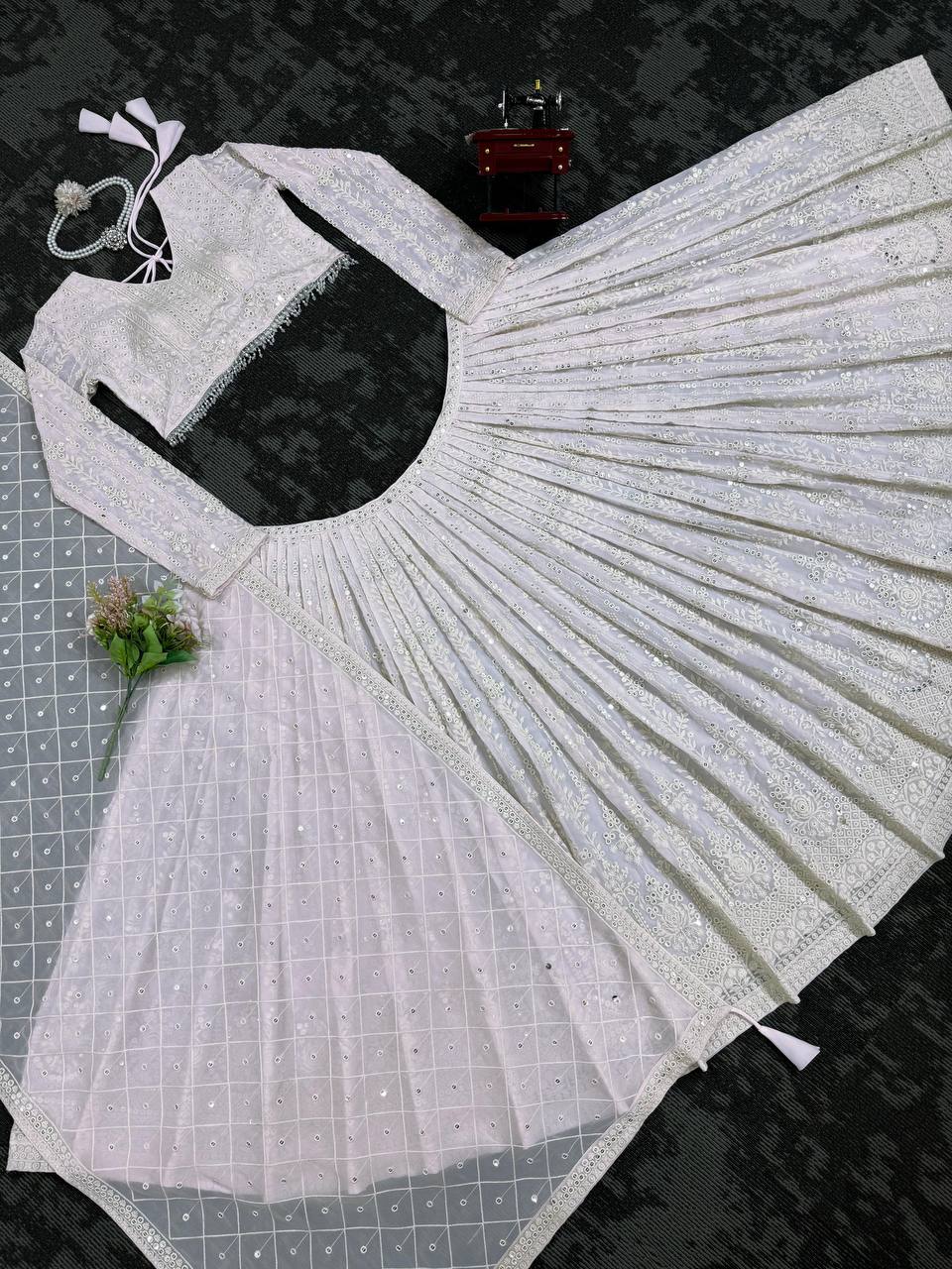 White Elegant Faux Georgette Lehenga Choli Set with  Sequin Work & Designer Dupatta Clothsvilla