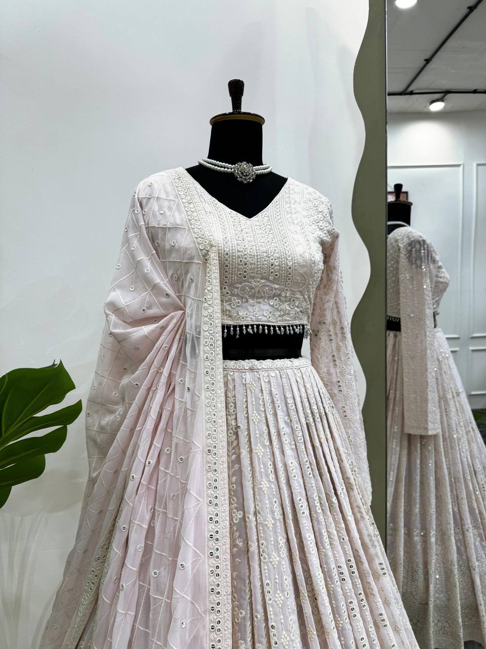 White Elegant Faux Georgette Lehenga Choli Set with  Sequin Work & Designer Dupatta Clothsvilla