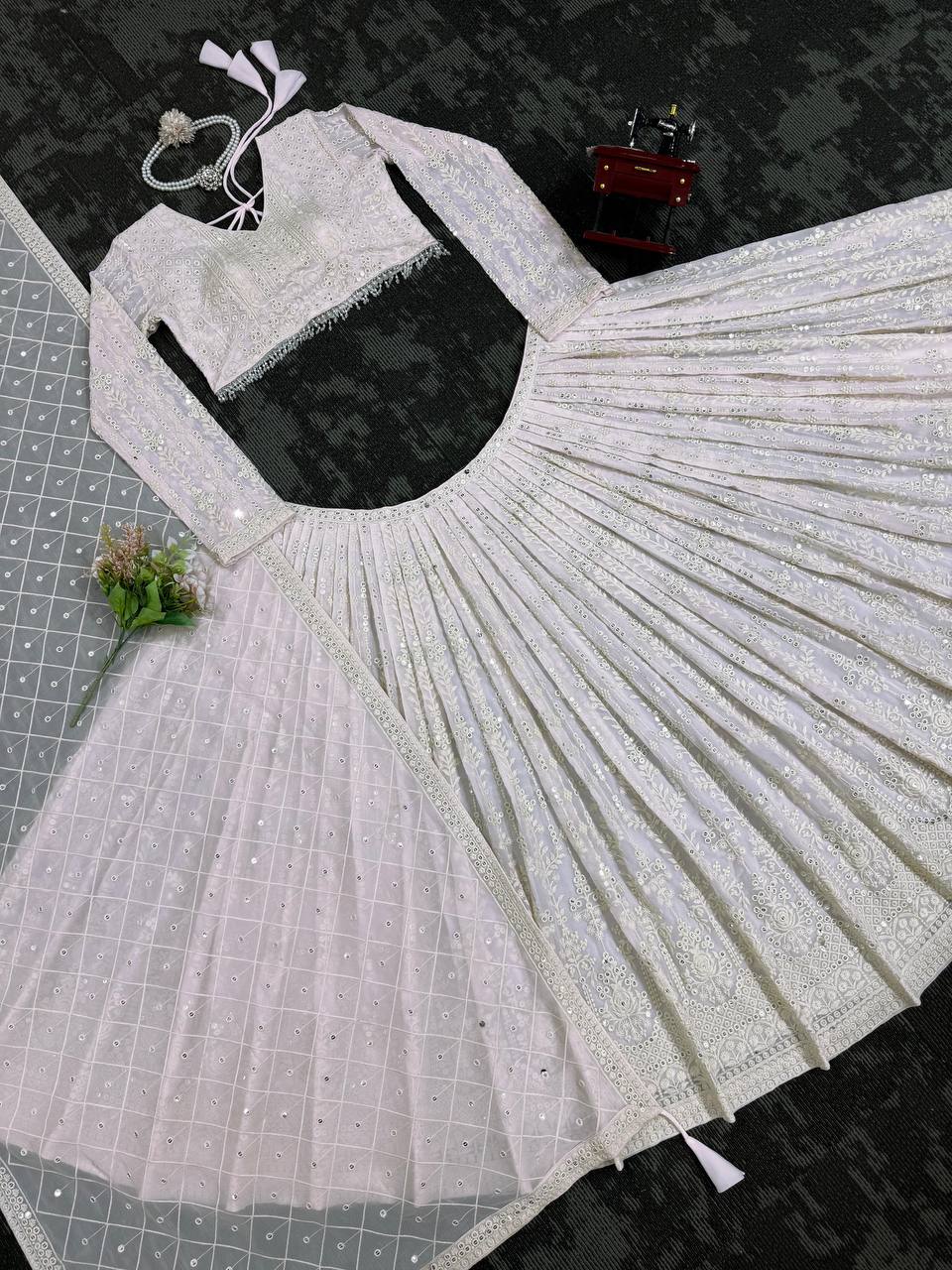 White Elegant Faux Georgette Lehenga Choli Set with  Sequin Work & Designer Dupatta Clothsvilla