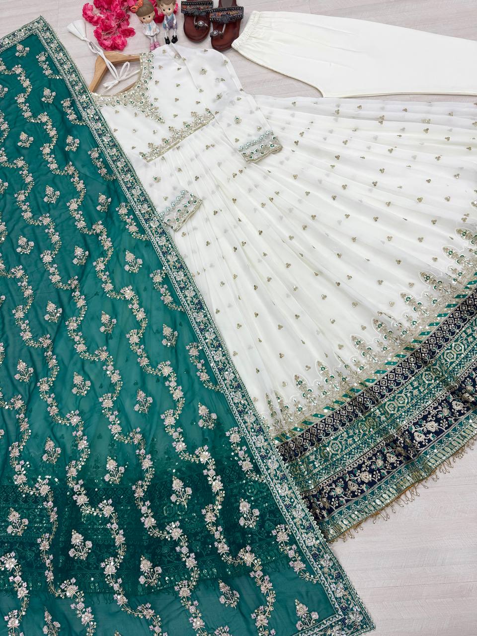 White Elegant Party Wear Heavy Faux Georgette Gown And Sky Blue Dupatta Set