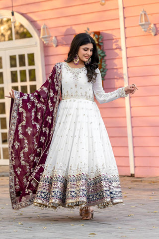 White Elegant Party Wear Heavy Faux Georgette Gown And Wine Dupatta Set