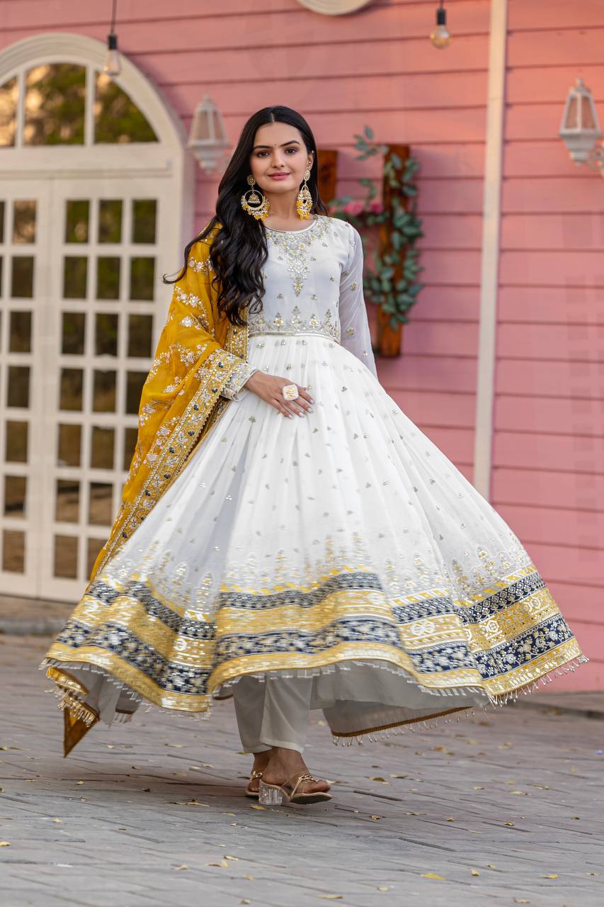 White Elegant Party Wear Heavy Faux Georgette Gown And Yellow Dupatta Set