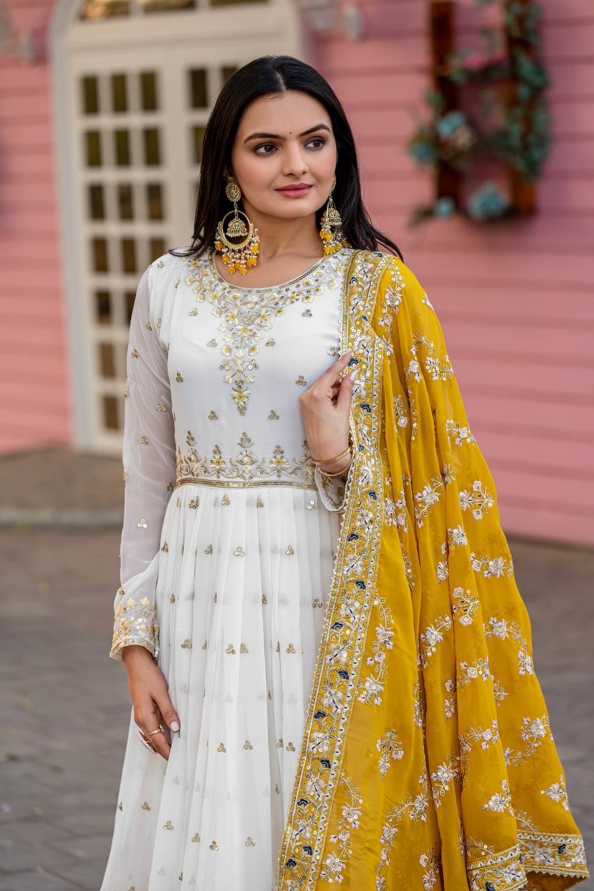 White Elegant Party Wear Heavy Faux Georgette Gown And Yellow Dupatta Set