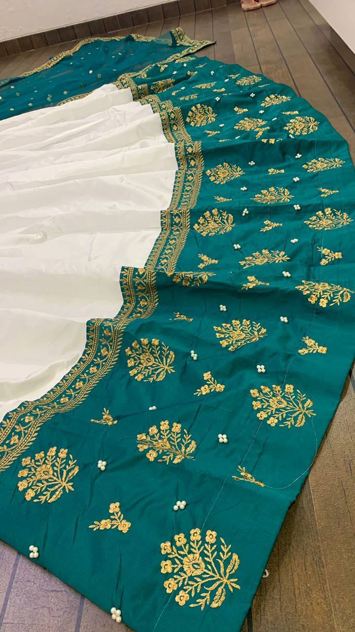White Elegant Tapeta Silk Lehenga with Pearl & Embroidery Work ClothsVilla