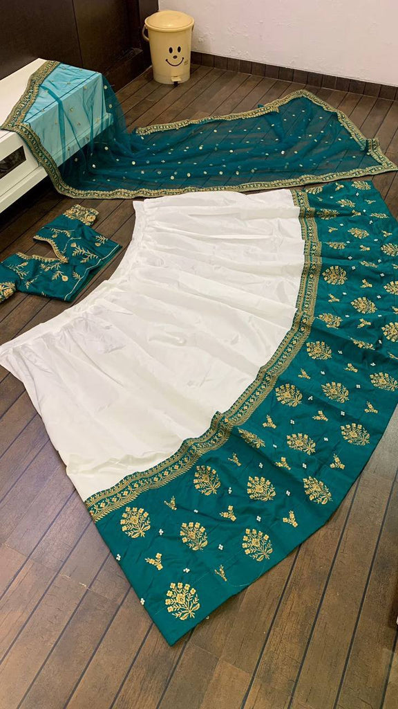 White Elegant Tapeta Silk Lehenga with Pearl & Embroidery Work ClothsVilla