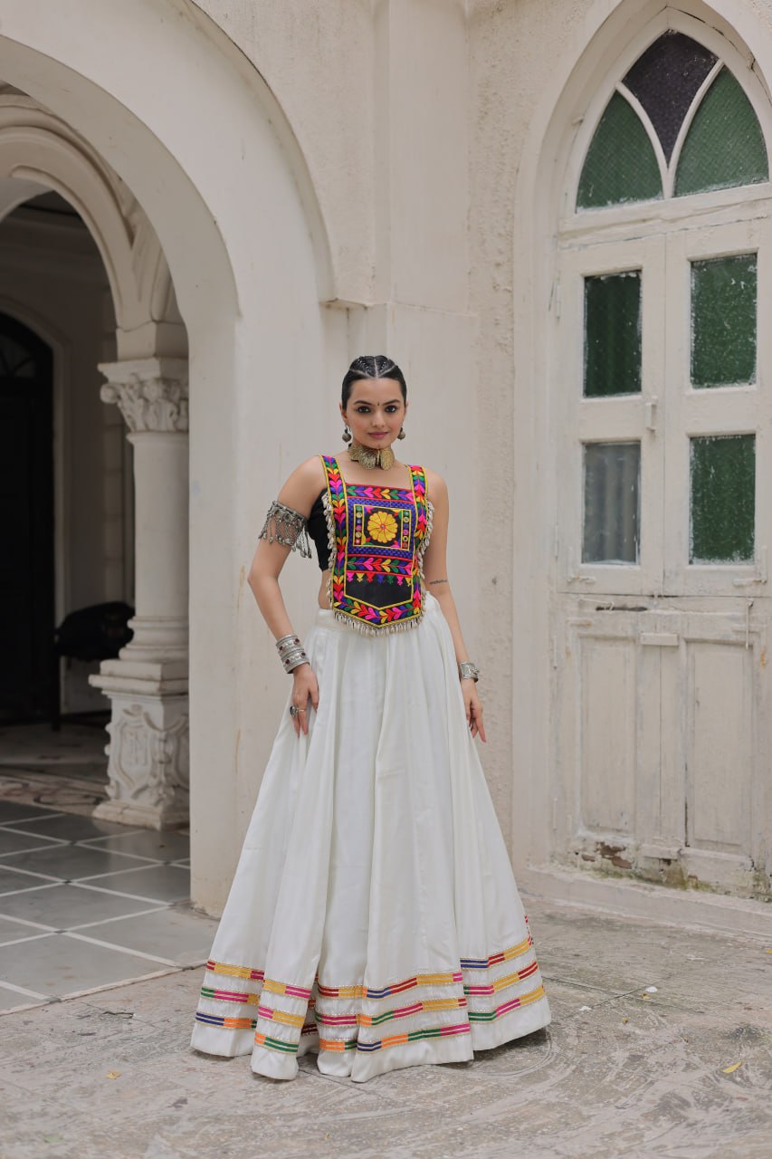 White Festive Roman Fabric Lehenga with black Kutchi Gamthi Embroidered Top ClothsVilla Main image