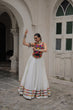 Load image into Gallery viewer, White Festive Roman Fabric Lehenga with black Kutchi Gamthi Embroidered Top ClothsVilla