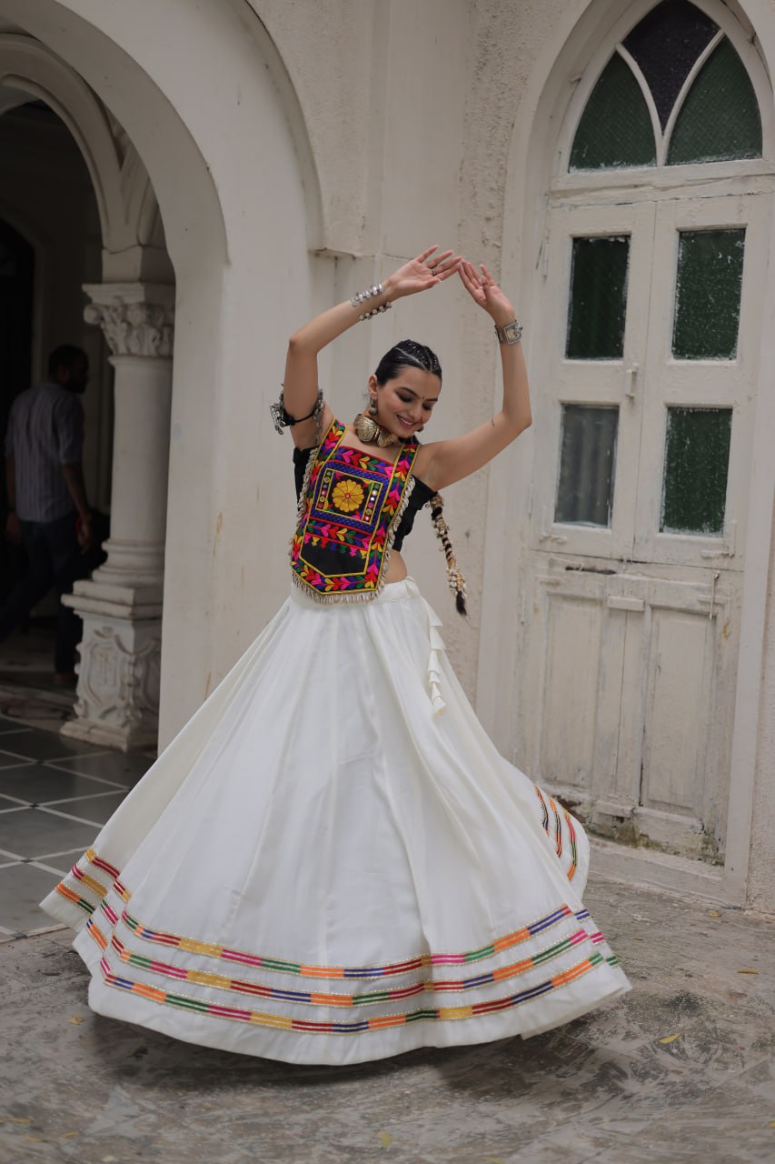 White Festive Roman Fabric Lehenga with black Kutchi Gamthi Embroidered Top ClothsVilla