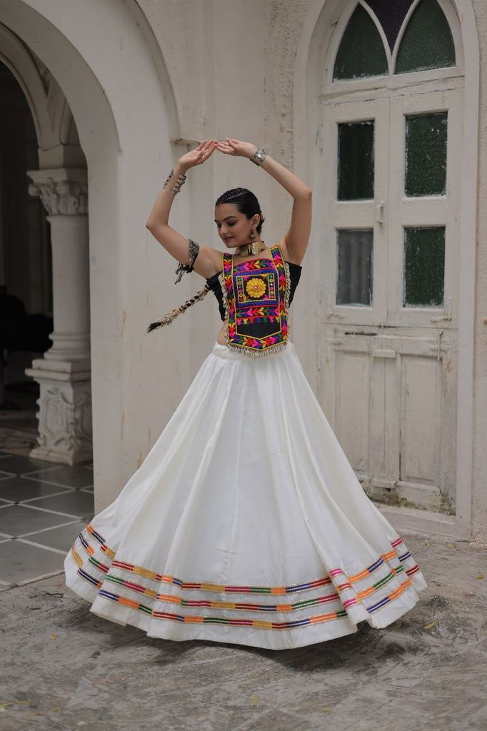 White Festive Roman Fabric Lehenga with black Kutchi Gamthi Embroidered Top ClothsVilla