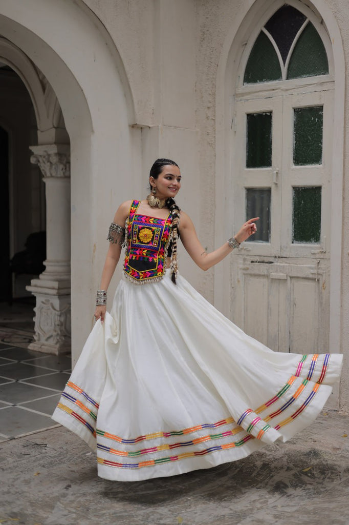White Festive Roman Fabric Lehenga with black Kutchi Gamthi Embroidered Top ClothsVilla